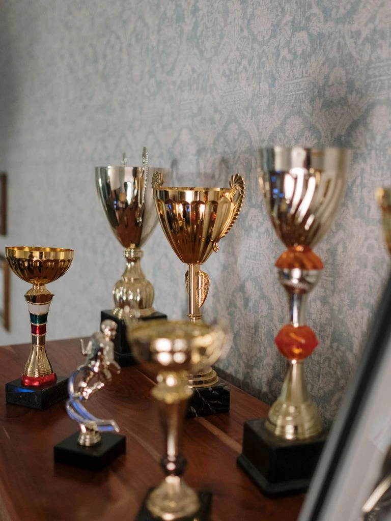 Lucie Award trophy displayed beside a fine art photography book